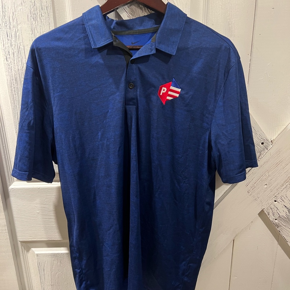 Nike dry fit team issued Puerto Rico polo shirt.
